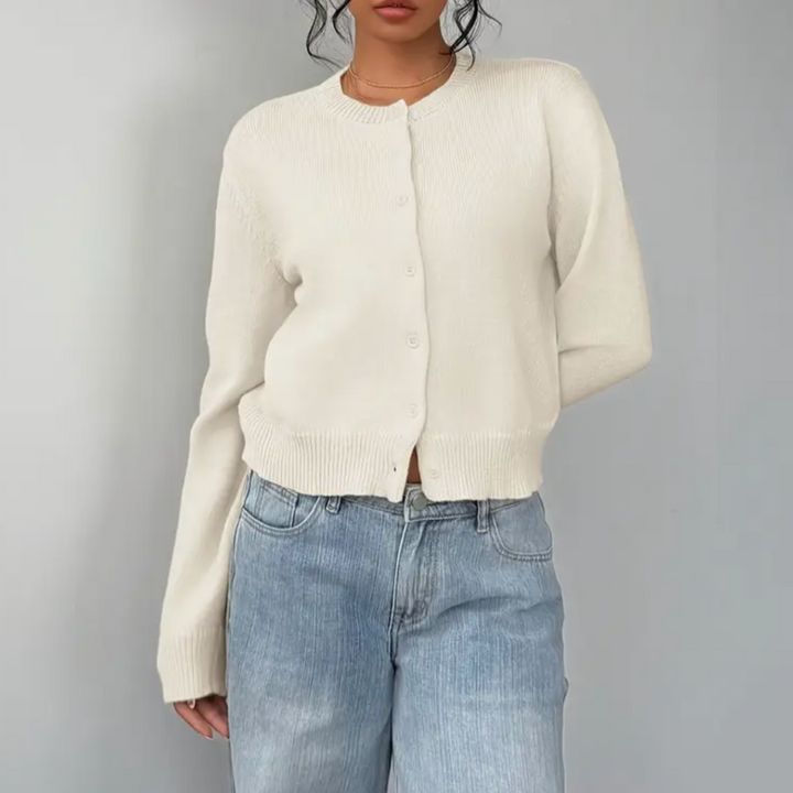 Lightweight women's cropped button-front cardigan in a classic beige, ideal for versatile layering.