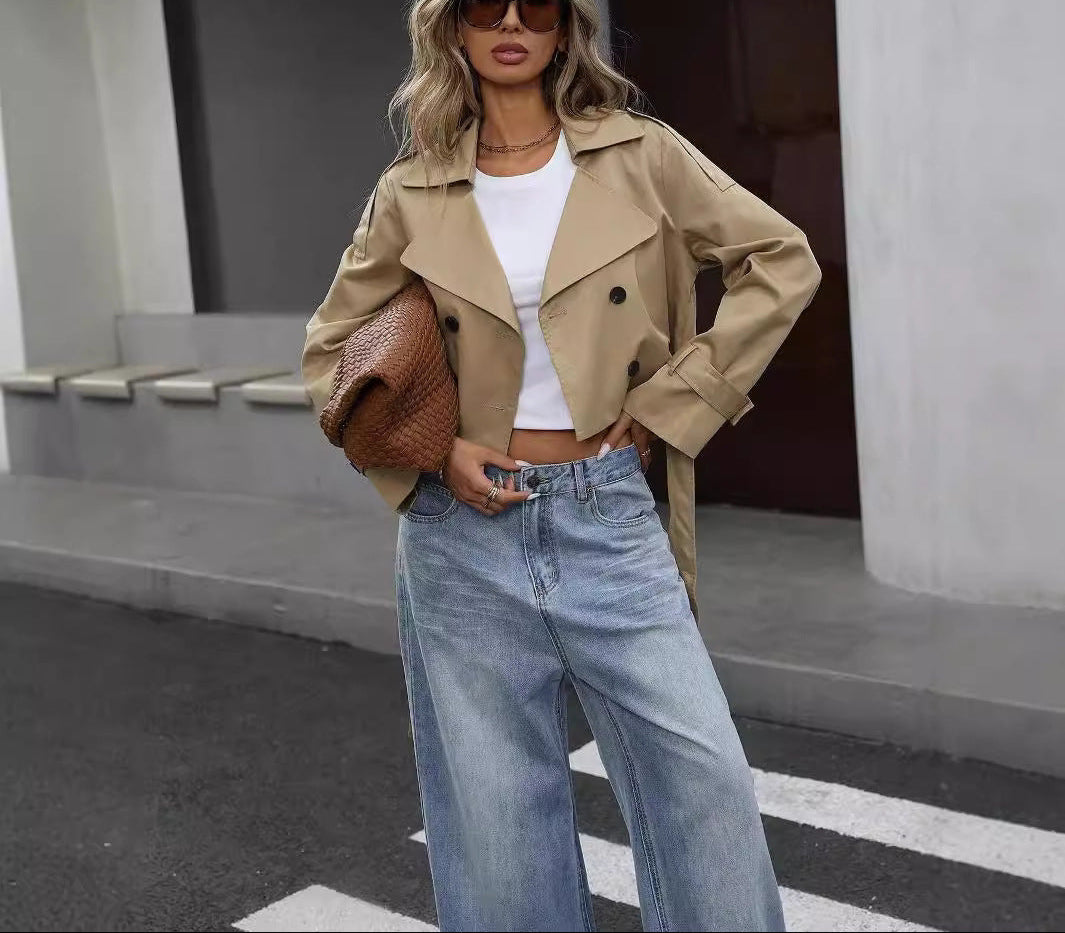 Close-up of a women's double-breasted cropped trench jacket; essential fall/spring outerwear