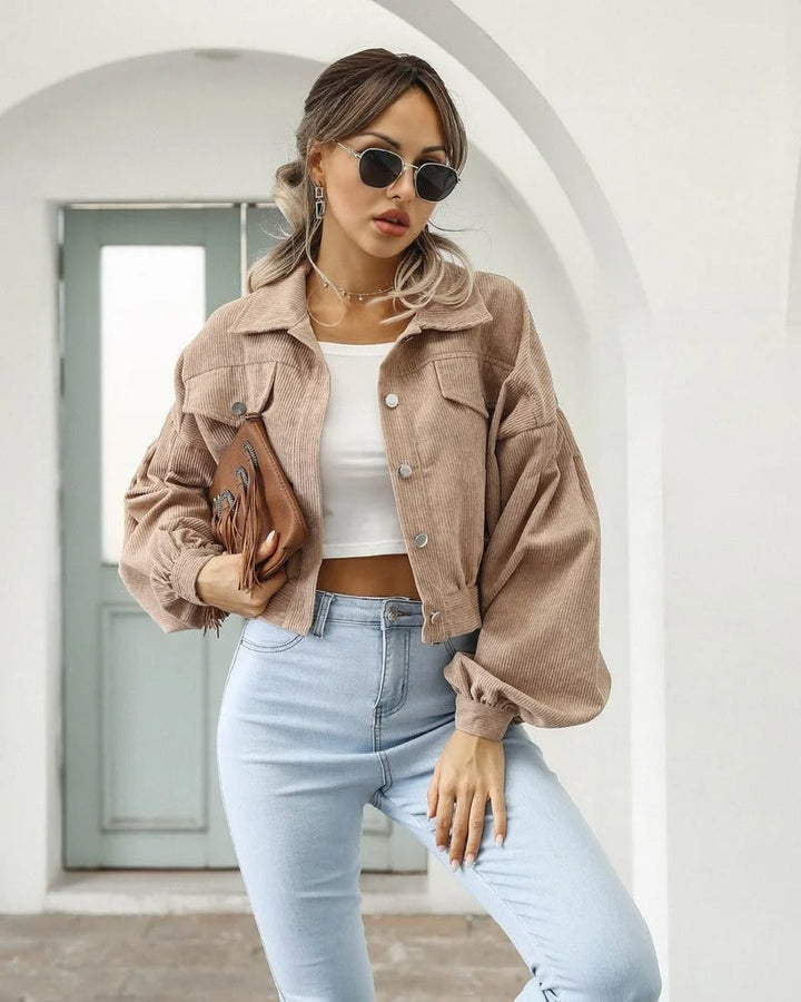 Amira women's cropped puffed sleeve denim jacket, button-front, stylish and versatile summer outerwear.