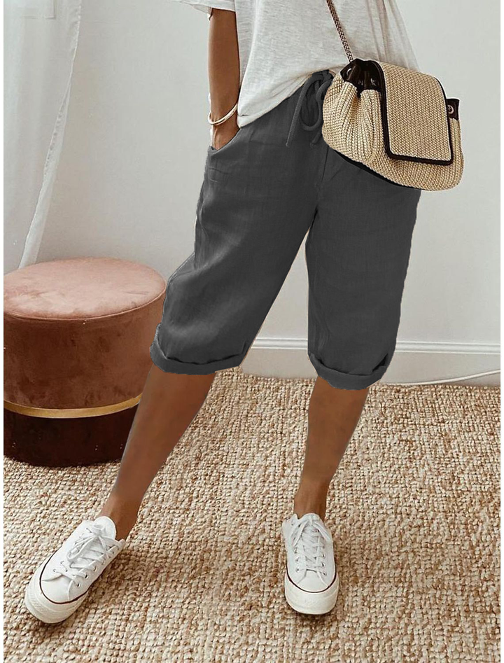 Comfortable women's cropped pull-on shorts. Straight leg design, elastic waist for versatile casual summer apparel.