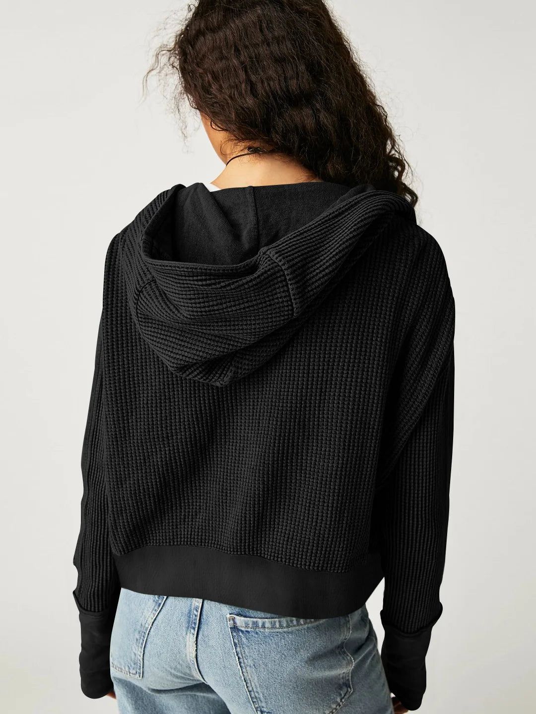 Mannequin showcasing a women's cropped waffle-knit zip hoodie, retail display