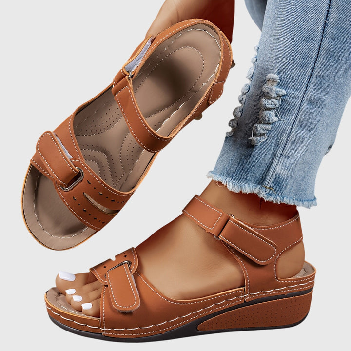 Elegant women's summer shoes with crystal design, providing orthopedic support and comfort.