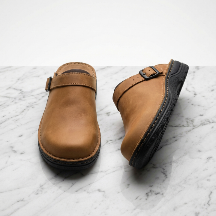 Black women's slip-on clogs with cushioned support, offering versatile everyday comfort and easy wear.