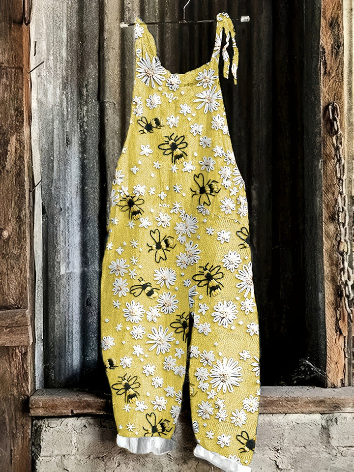 Summer women's daisy bee print tie-shoulder jumpsuit, with a comfortable wide-leg design.