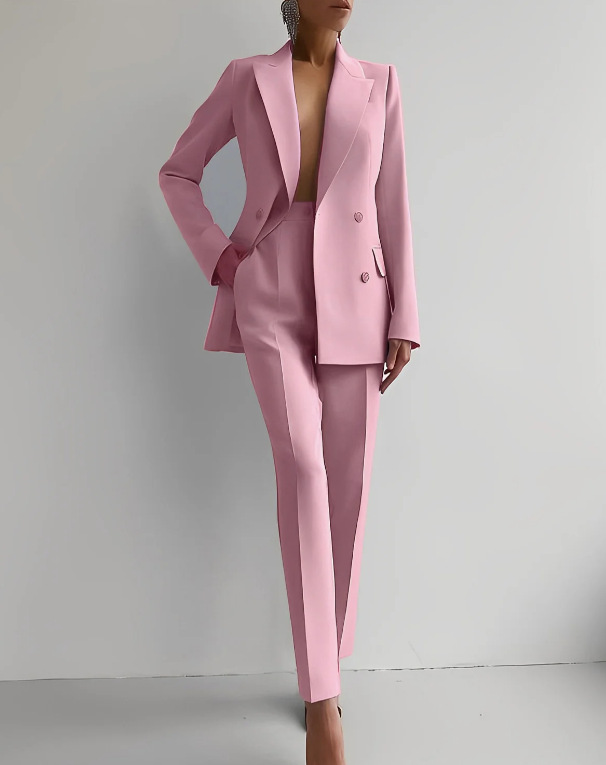 Red women's double-breasted blazer & slim trousers suit. Chic formal outfit, perfect for events.