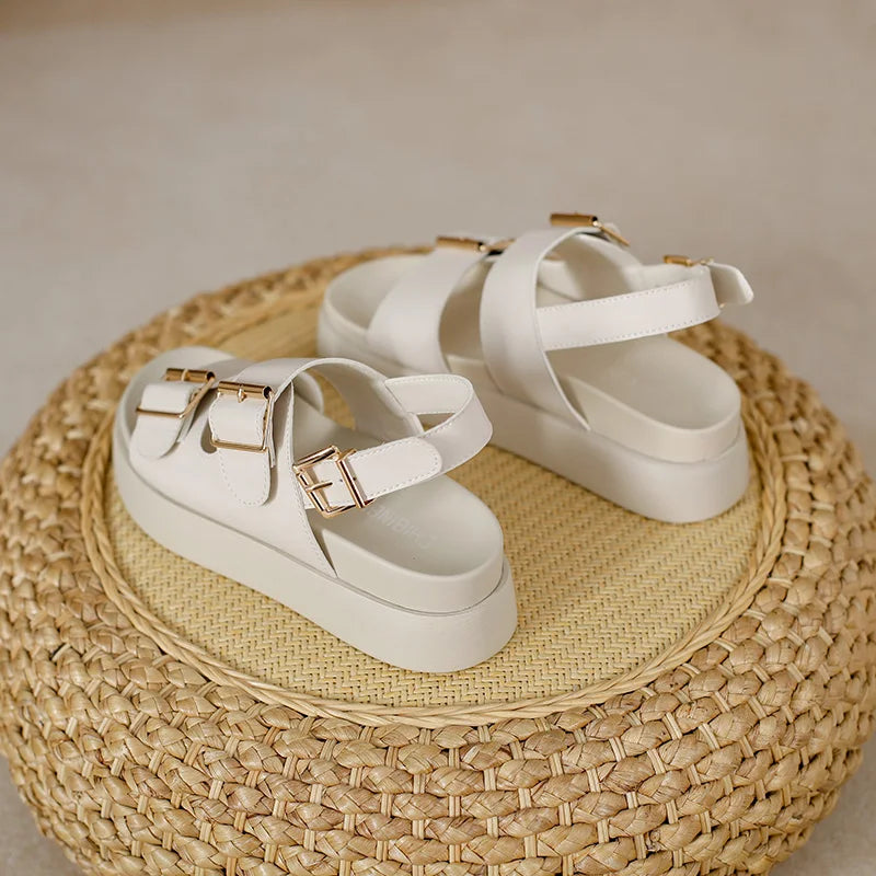 Comfortable women's platform sandals with a minimalist double buckle design in black