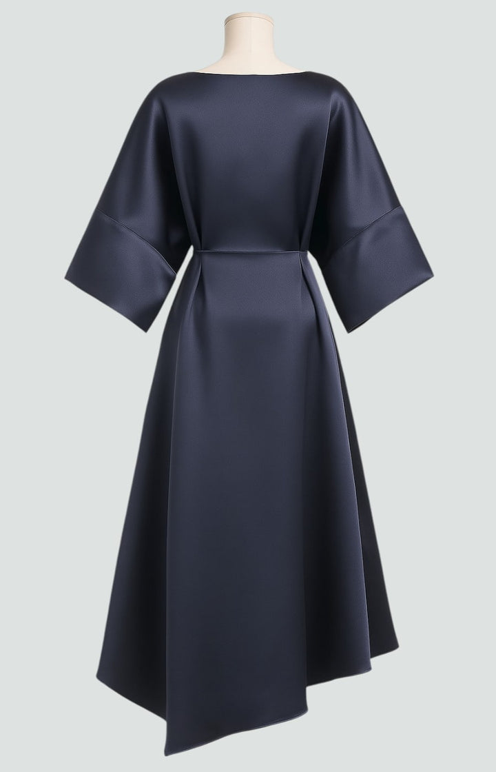 Fashionable women's midi dress, designed with draped batwing sleeves for a chic, loose, and comfortable look.