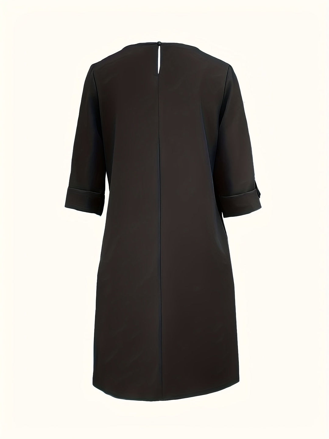 Model wearing a women's effortless all-day comfort dress, showing versatile fit & style.