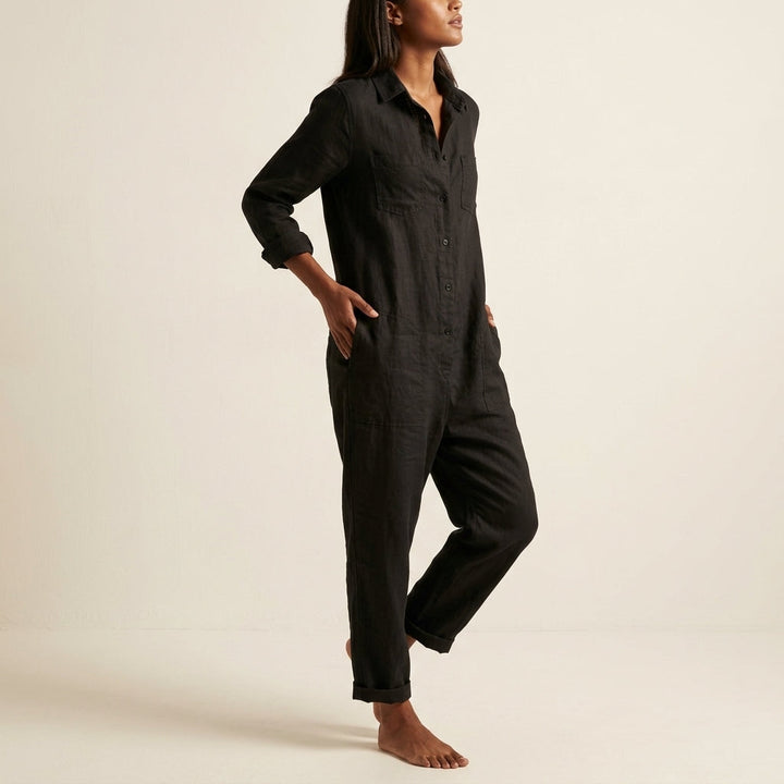 Relaxed fit women's button-front jumpsuit. Casual yet elegant, suitable for all occasions. Comfortable wear.
