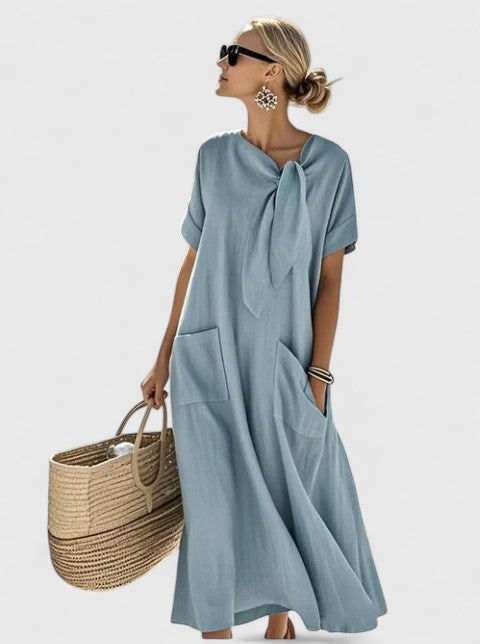 Elegant women's summer dress featuring an effortless flowy silhouette for comfortable daywear or evening occasions.