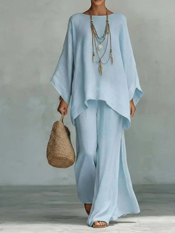 Soft linen blend two-piece set for women. Enjoy relaxed comfort in this oversized top and wide-leg pant summer outfit.