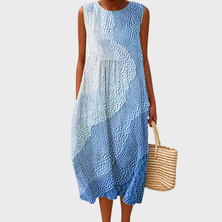 Easy-wear women's plaid sleeveless midi dress. Perfect casual summer or vacation style, lightweight & chic.