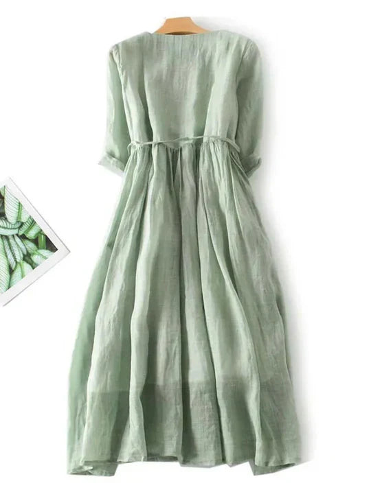 Back view of a versatile women's summer dress, showing its relaxed fit, perfect for comfortable everyday wear.