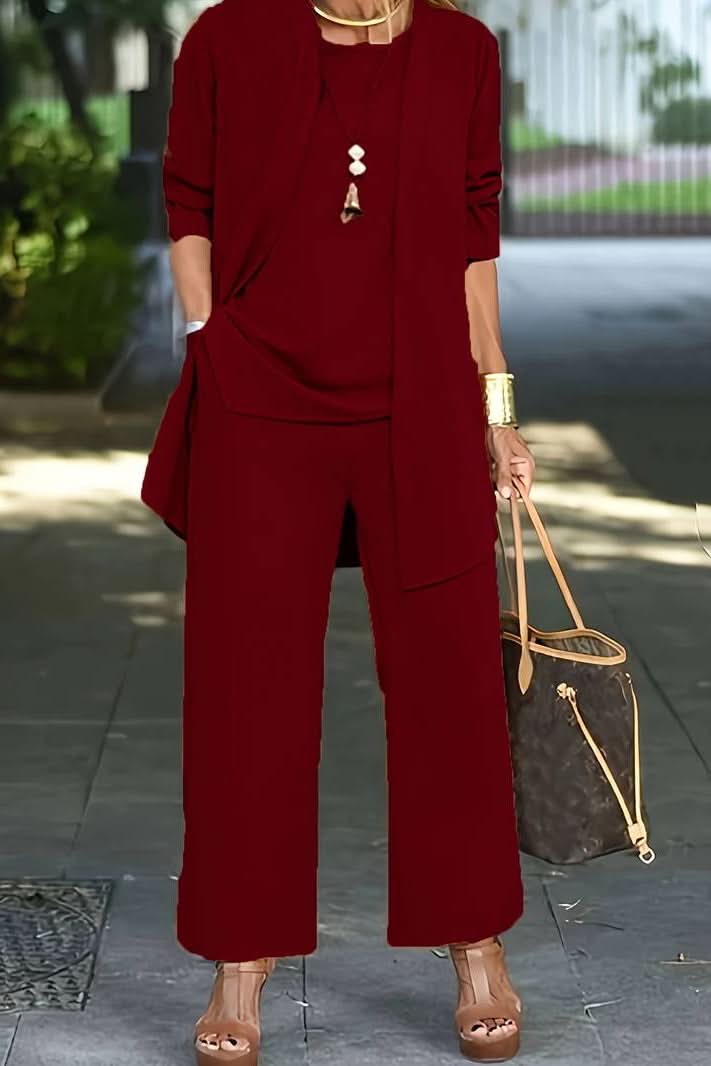 Woman relaxing in a breathable women's summer lounge set, a stylish 3-piece for ultimate comfort.