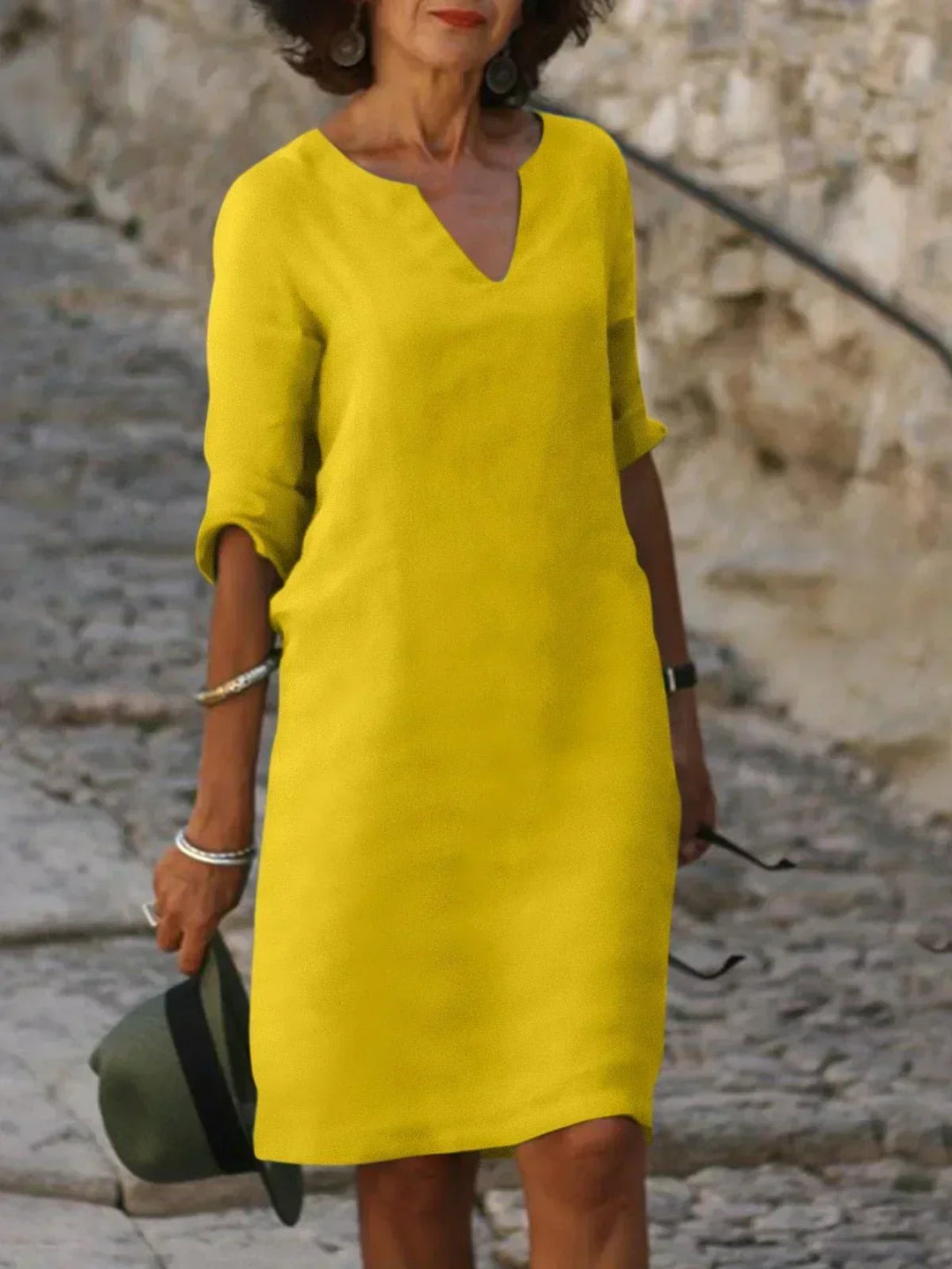 Effortless women's v-neck mini dress. 3/4 sleeve, relaxed fit, comfortable casual everyday wear.