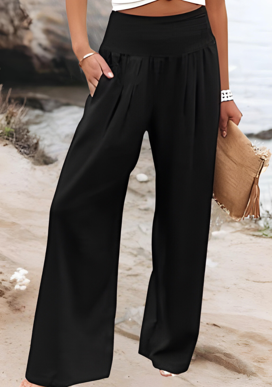 Comfortable women's flowy wide leg beach pants, high waist & elastic for casual summer fashion.