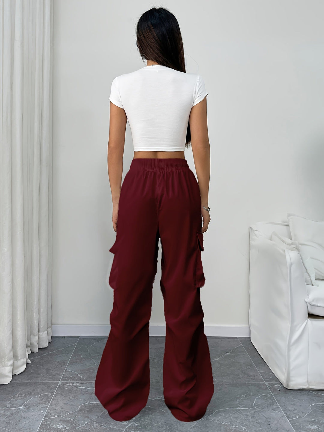 Women's casual wide leg cargo pants with adjustable drawstring waist. Relaxed fit, perfect for comfort & style.