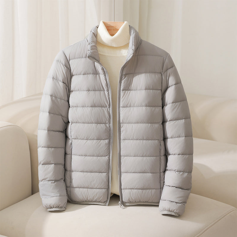 Blue women's Elara quilted puffer jacket, a stylish & lightweight cold weather outerwear option.