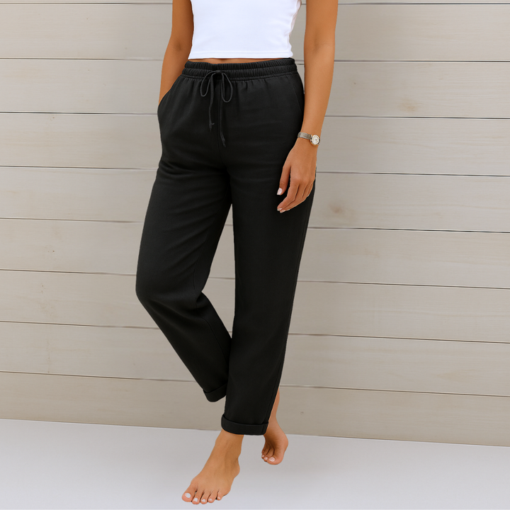 Comfortable women's drawstring ankle pants with elastic waist & straight leg design for easy, modern everyday wear.