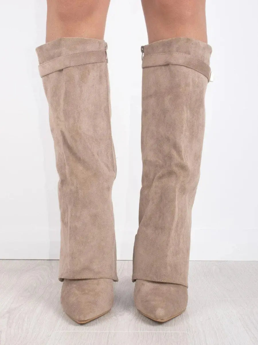 Winter wear: chic brown pointed toe knee-high boots for women, featuring an elegant wedge heel.