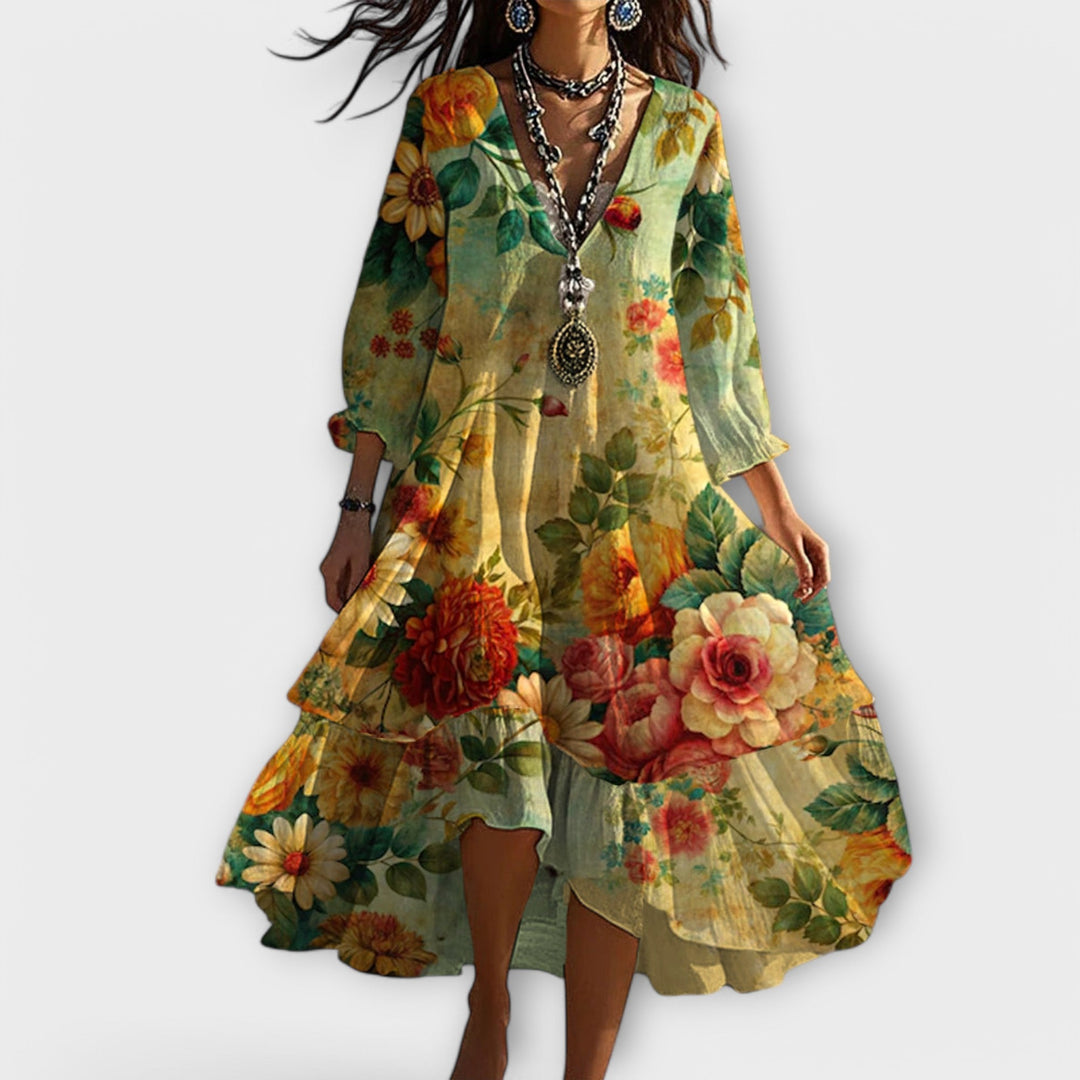 Women's elegant boho floral midi dress, V-neck, 3/4 sleeves & tiered hem. Perfect casual spring/summer flowy style.