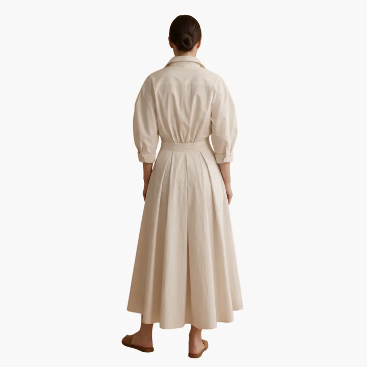 Sophisticated women's shirt dress, elegant button-front design with a defined waist for timeless style.