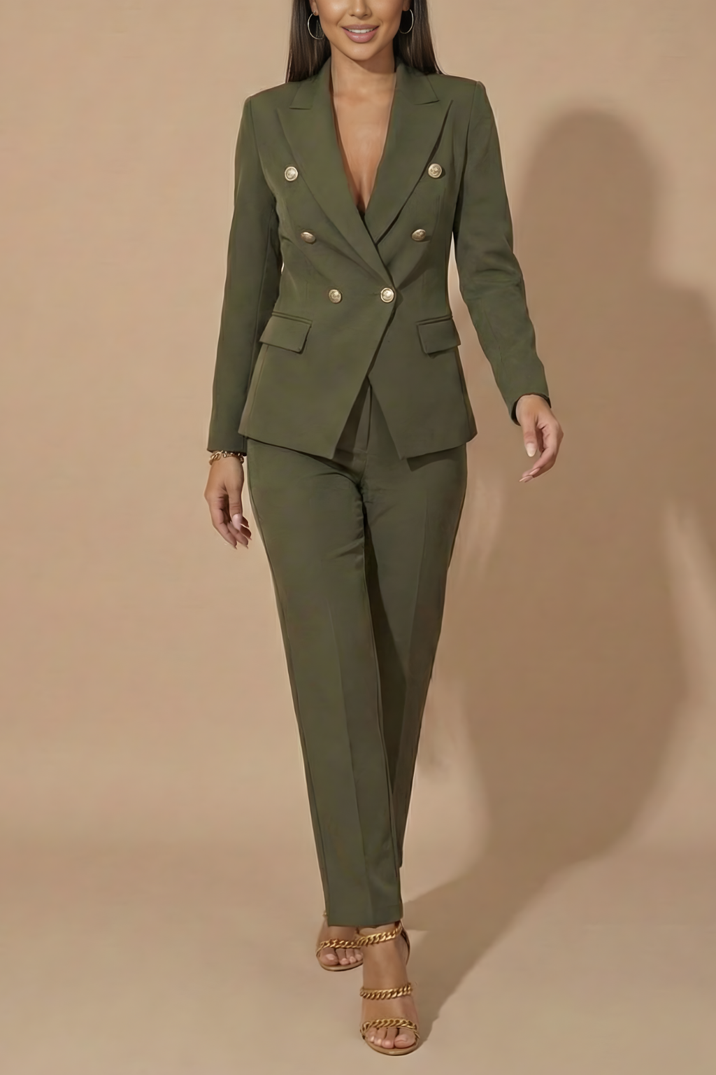 Chic women's suit with gold button double-breasted blazer & sleek tailored trousers for a polished look.