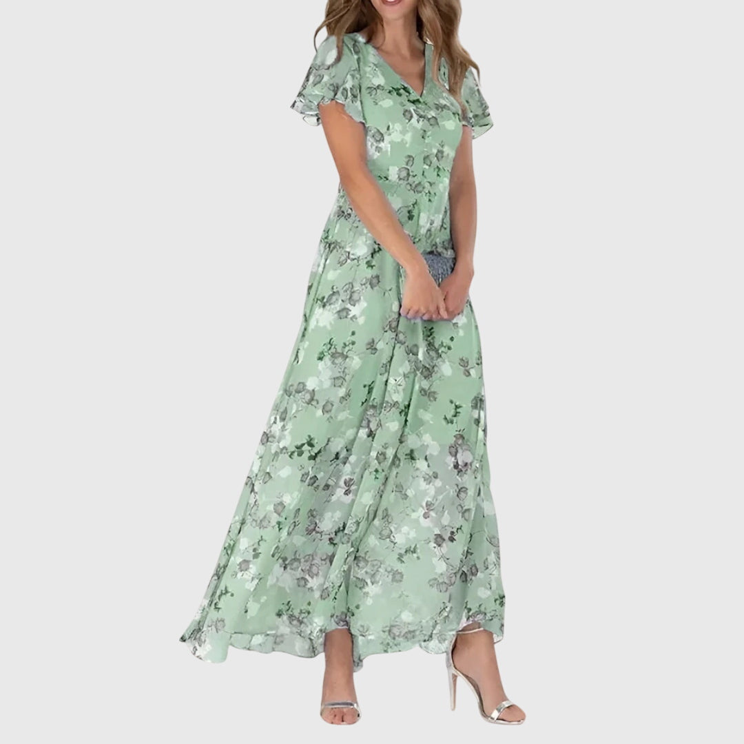 Feminine long floral maxi dress for women, with a chic V-neck, flutter sleeves, great for parties/weddings.
