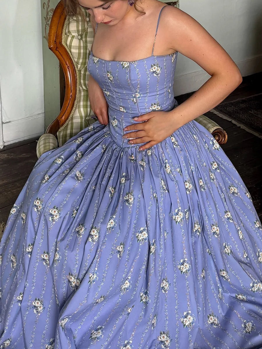 Formal women's floral corset midi dress. Elegant and perfect for special occasion parties and events.