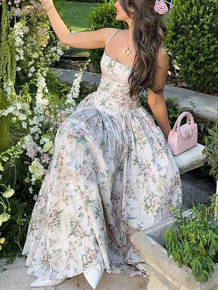 Beautiful women's floral print midi dress with a flattering corset top, perfect for prom night.
