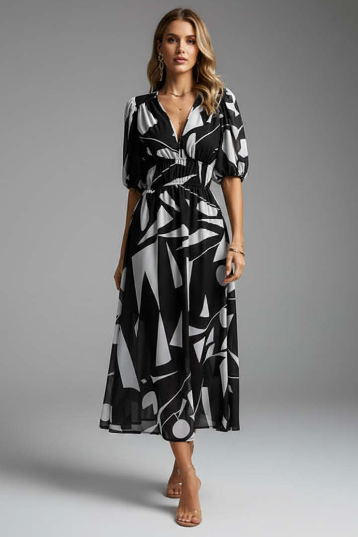 Fashionable women's floral midi dress featuring elegant puff sleeves, a flattering V-neck, and a comfortable elastic waist.