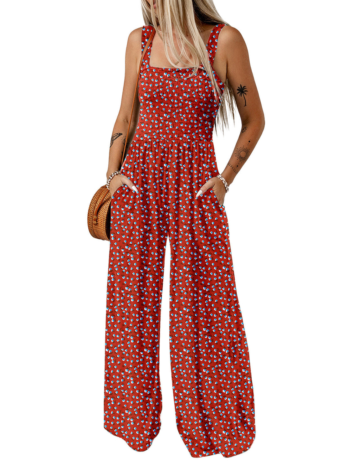 Close-up of the fabric texture on a women's floral wide-leg spring fashion jumpsuit.