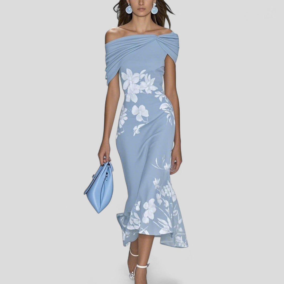 Flowing women's midi dress with an elegant, unique print. A versatile statement piece for spring and summer fashion.