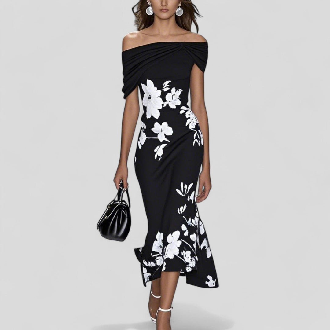 Stylish women's midi dress showcasing a unique, artistic print. Ideal for evening events, parties, or sophisticated casual looks.