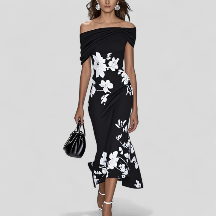 Stylish women's midi dress showcasing a unique, artistic print. Ideal for evening events, parties, or sophisticated casual looks.