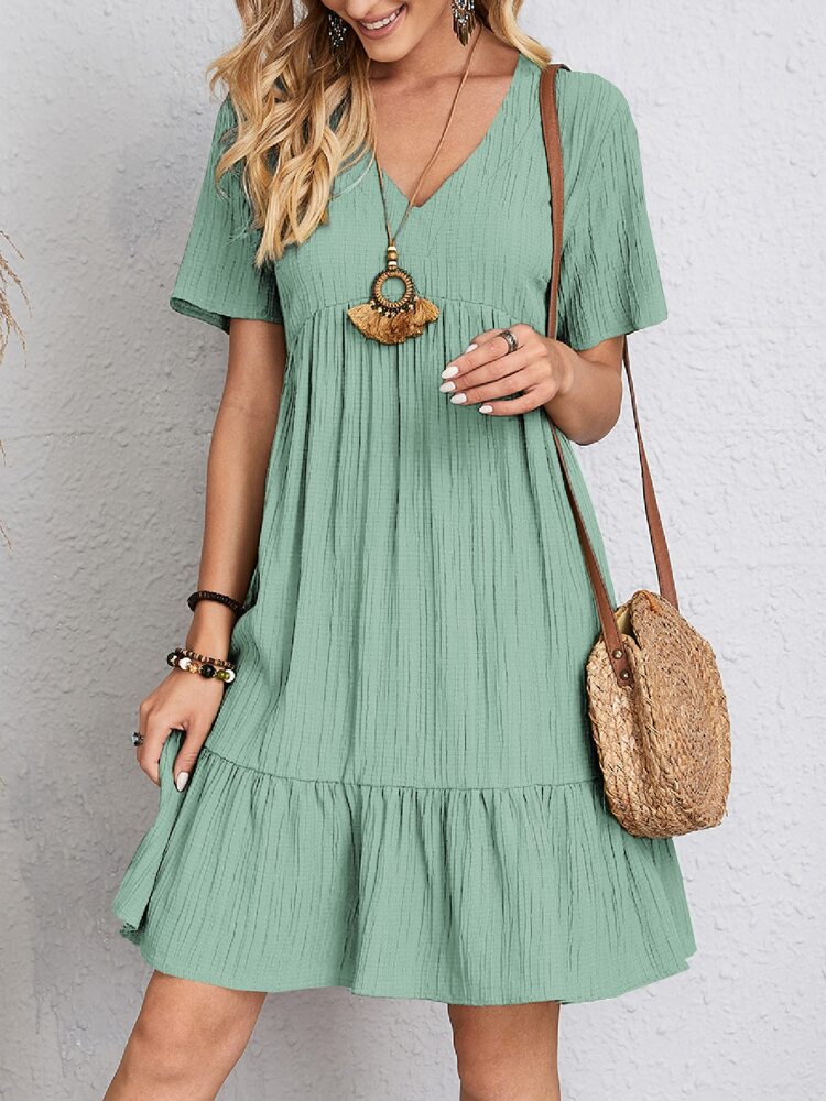 Elegant women's midi dress, perfect for evening events, offering a flattering fit and chic modest style.
