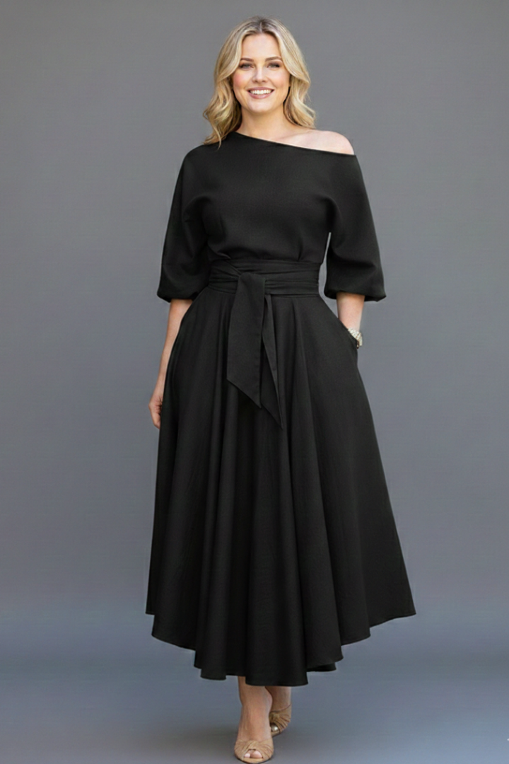 Elegant women's off-shoulder midi dress with defined waist & chic lantern sleeves for party or event.