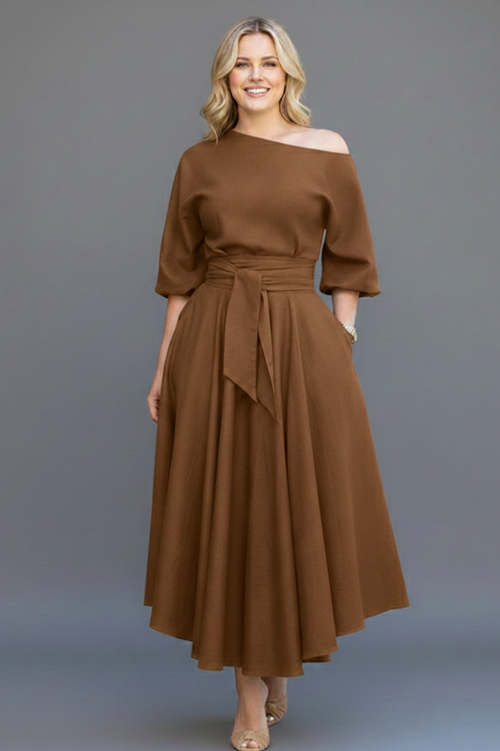 Fashionable women's long sleeve off-shoulder midi dress with elegant lantern sleeves for evening events.