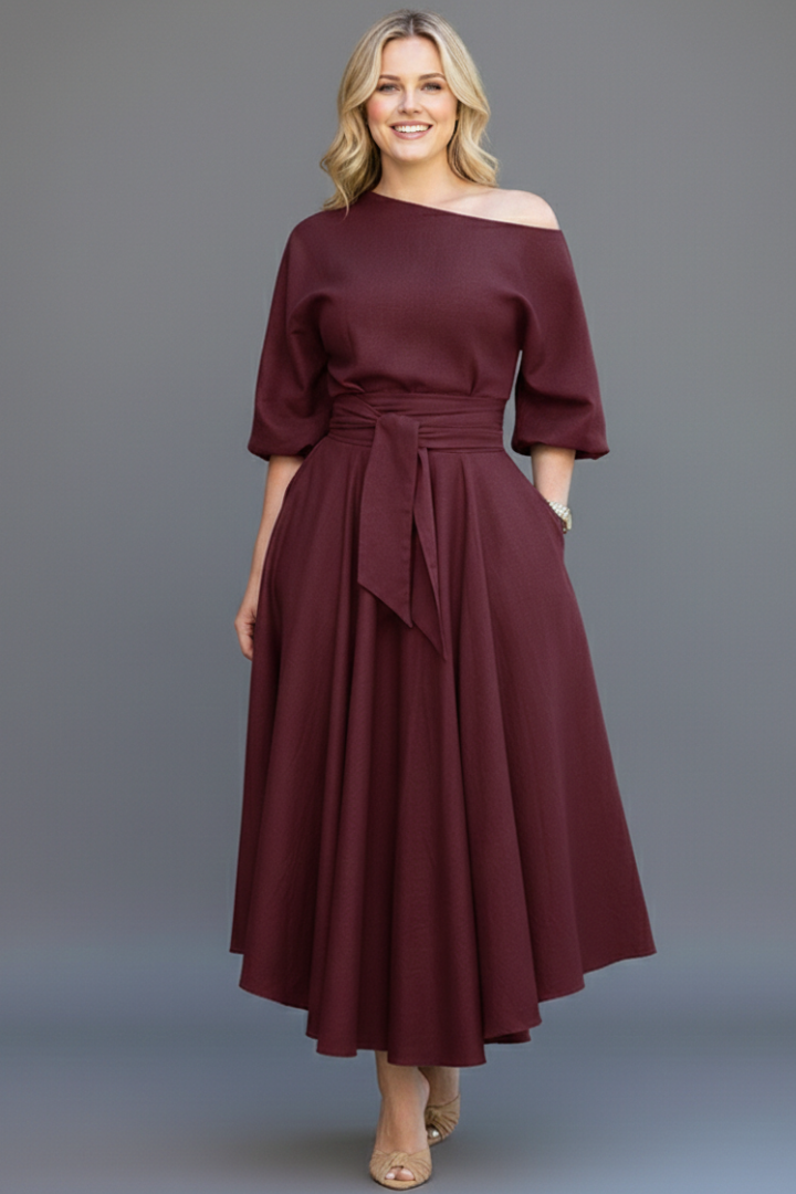 Sophisticated off-shoulder midi dress for women, with elegant lantern sleeves and defined waist. Party-ready.