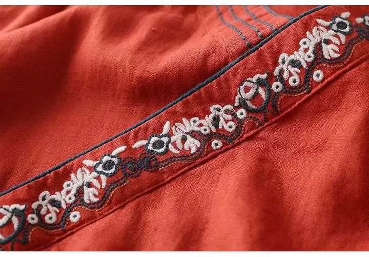 Comfortable & elegant women's patterned blouse, relaxed fit, V-neck. Versatile casual top.