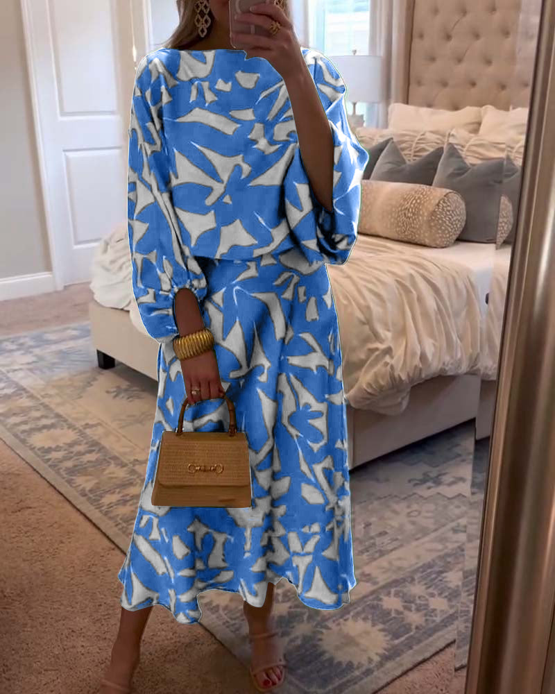 Versatile women's matching set: vibrant print top & skirt with elegant lantern sleeves.