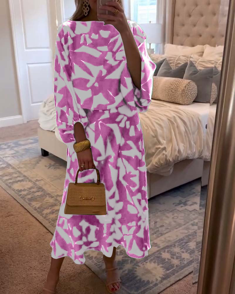 Casual women's printed two-piece outfit, featuring a chic top and matching skirt.