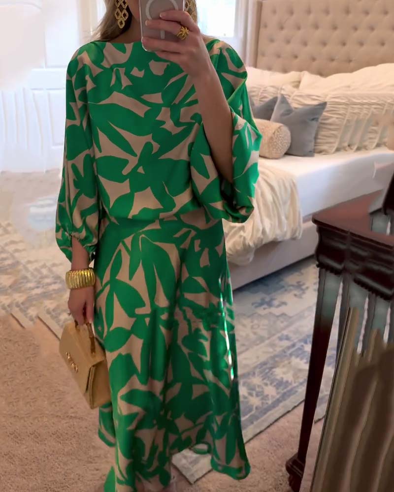 Women's two-piece outfit: stunning printed top with lantern sleeves & flowy skirt.