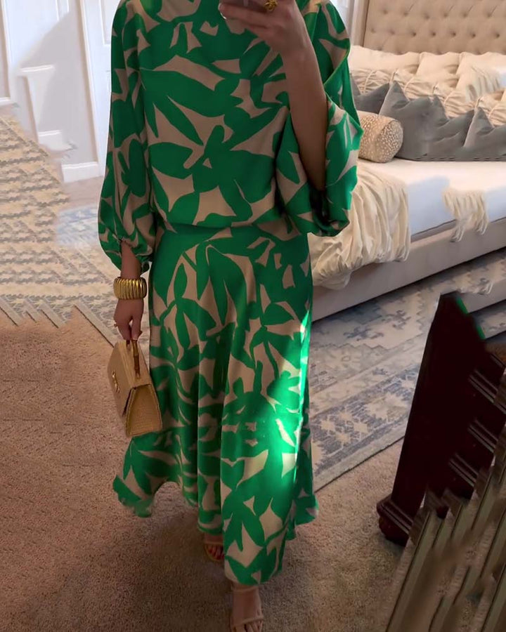 Chic women's matching set: printed top & skirt, designed with elegant lantern sleeves.