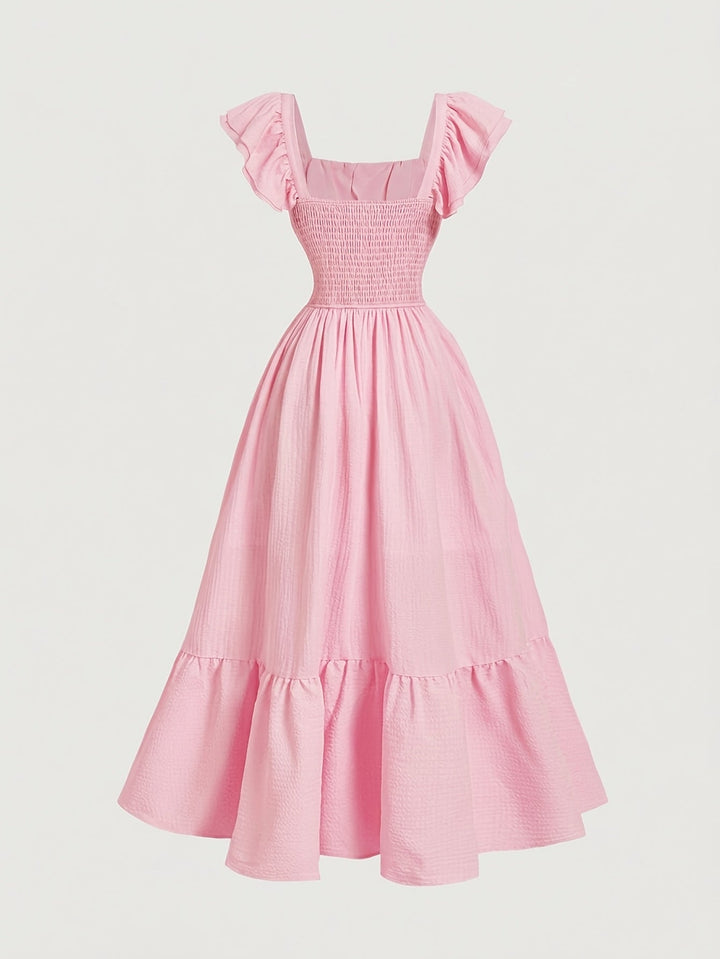 Designer women's ruffled off-shoulder maxi dress, a stunning piece for any summer or evening event.