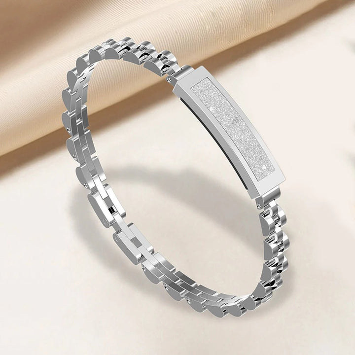 Women's smart health monitor bracelet, elegantly tracking sleep, steps & activity with smart notifications.