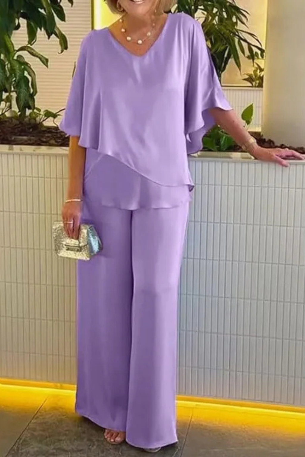 Designer women's two-piece: batwing V-neck top & wide leg pants. Ultimate comfort fashion for elegant style.