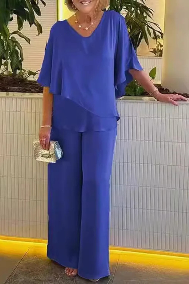 Sophisticated women's batwing sleeve V-neck top and wide leg pant set. Versatile two-piece for stylish women.