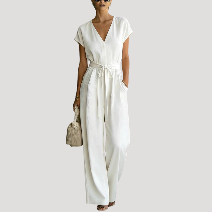 Women's elegant V-neck wide leg jumpsuit with tie waist & cap sleeves, perfect for summer fashion.