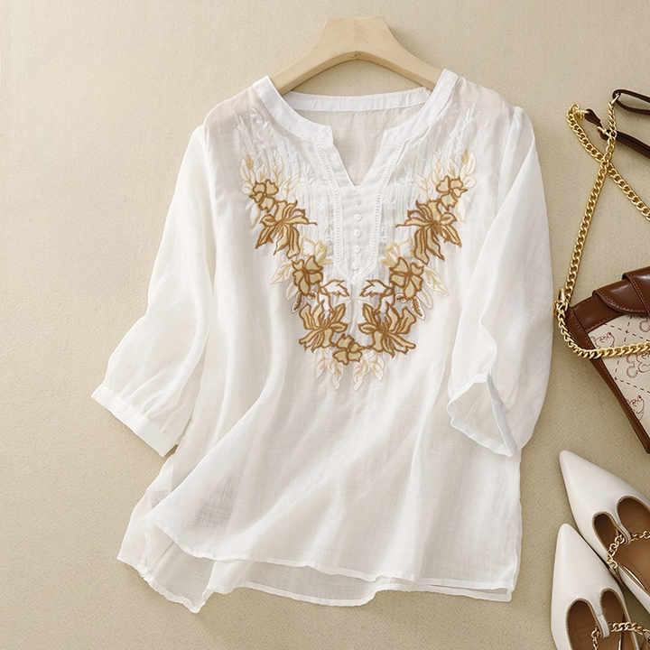 Breathable women's relaxed fit linen top in a natural fabric, an embroidered tunic for everyday fashion